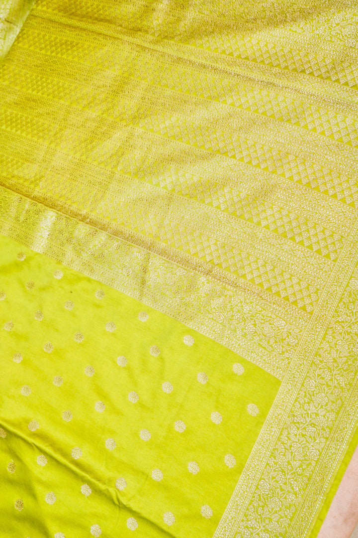 Vibrant Grace in Neon Green Mashru Silk Saree with All-Over Silver Zari Weave