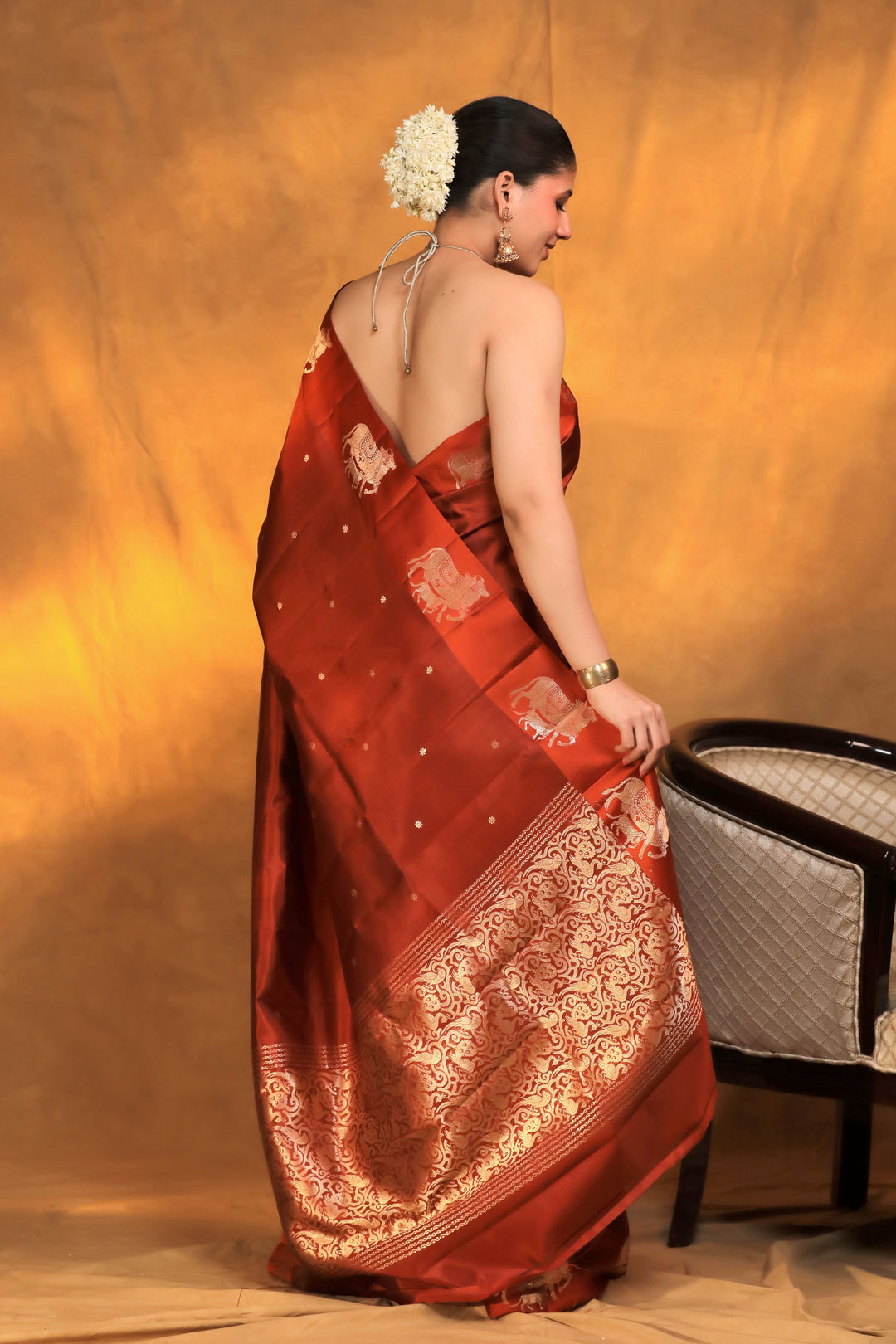 handwoven banarasi pure mashru silk kamdhenu motif satin border saree rust orange back view