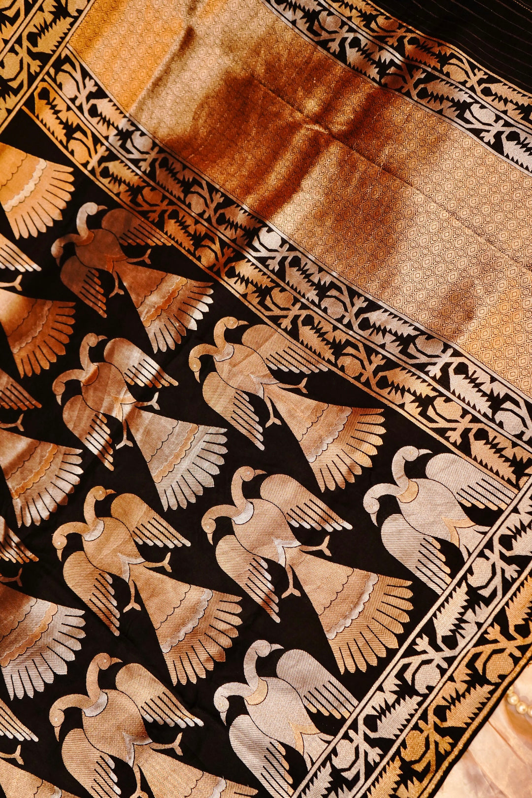 Opulent Black Nita Ambani Inspired Munga Crepe Birds Motif Cocktail Saree Collection