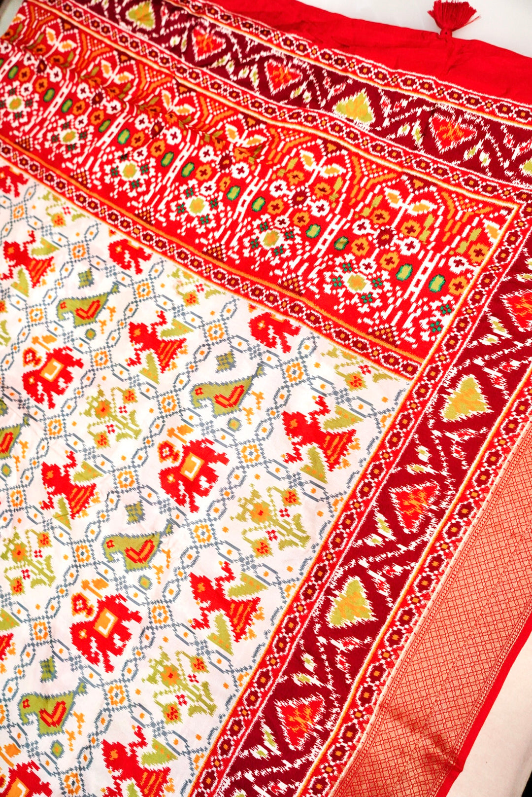 White Patola Silk Saree with Zari Weave Contrast Border