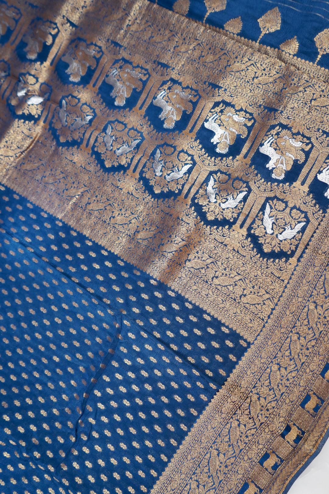 Elegant Teal Blue Banarasi Chinon Georgette Saree with Antique Zari Figure Motifs