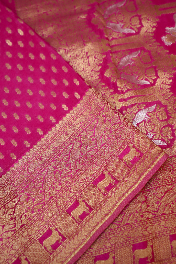 Vibrant Rani Pink Banarasi Chinon Georgette Saree with Antique Zari Figure Motifs