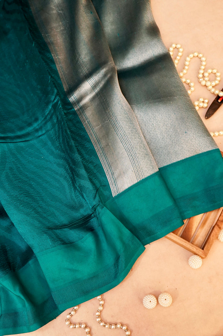 Enchanted Teal Elegance – Pure Handloom Silk Saree with Animal Weaving