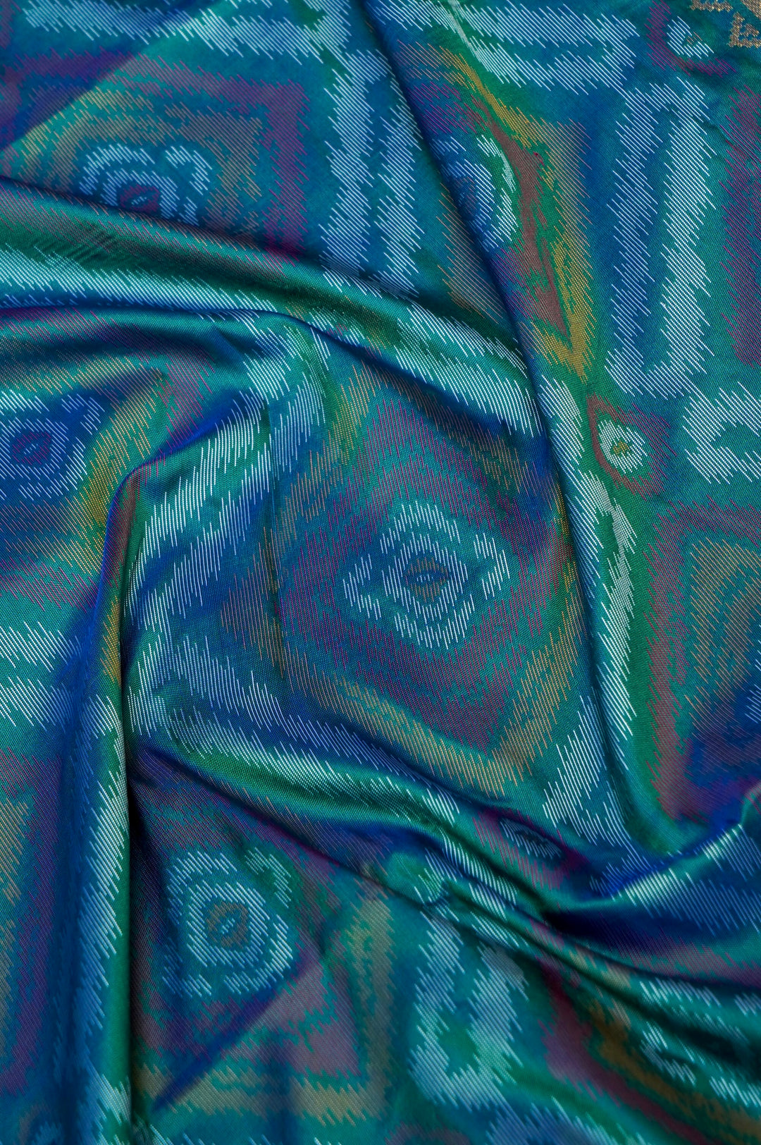 Teal Green Soft Silk Ikat Inspired Saree with Golden Zari Heavy Border & Pallu