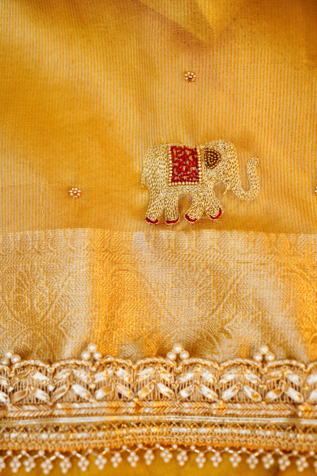 Golden Maharani Tissue Silk Saree with Gajanand Motif Embroidery