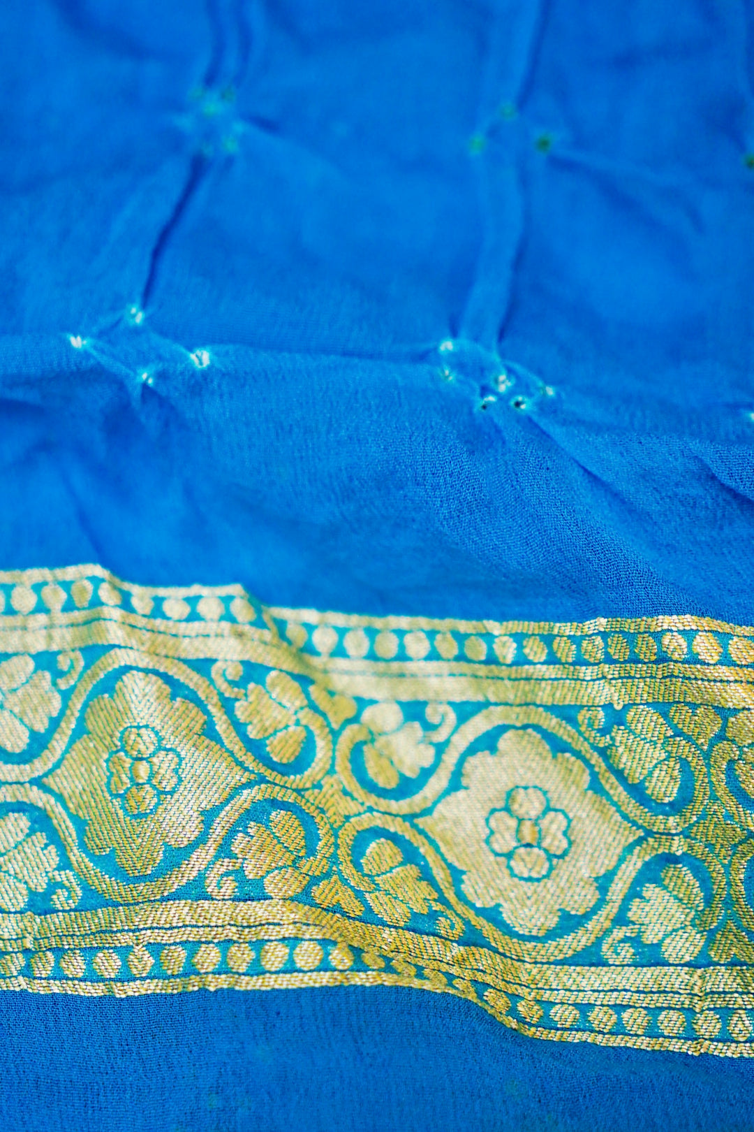 Fresh Elegance Light Green Khaddi Georgette Bandhej Saree with Sky Blue Border