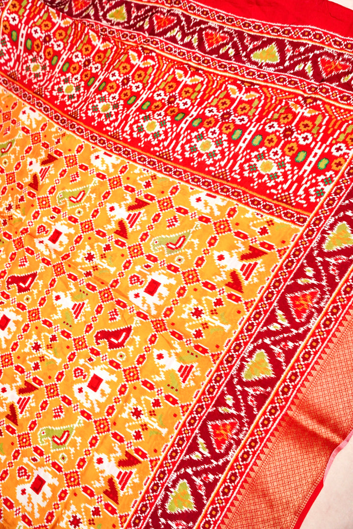 Yellow Patola Silk Saree with Zari Weave Contrast Border