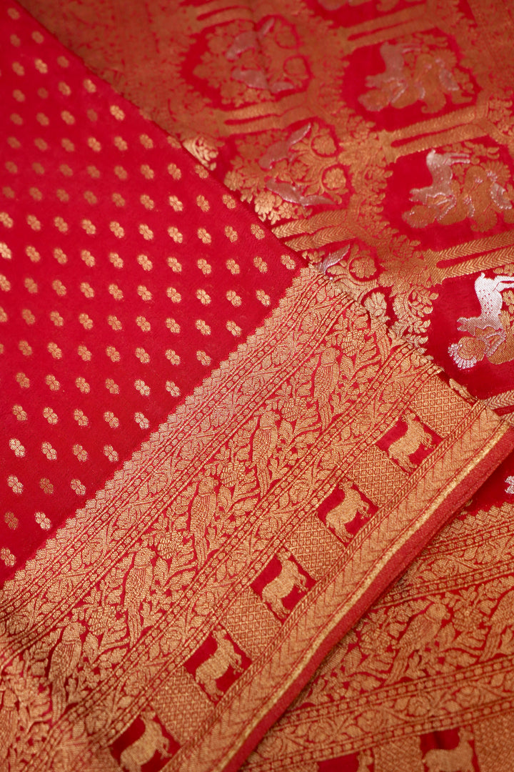 Striking Cherry Red Banarasi Chinon Georgette Saree with Antique Zari Figure Motifs