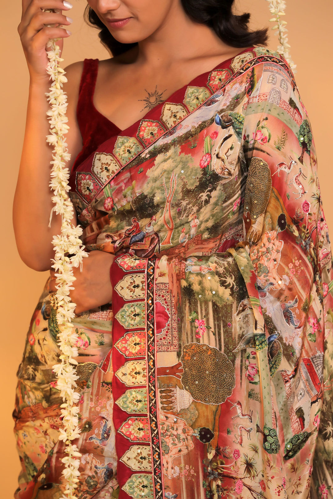 cherry red crepe silk katha embroidery figure motif saree closeup view 1