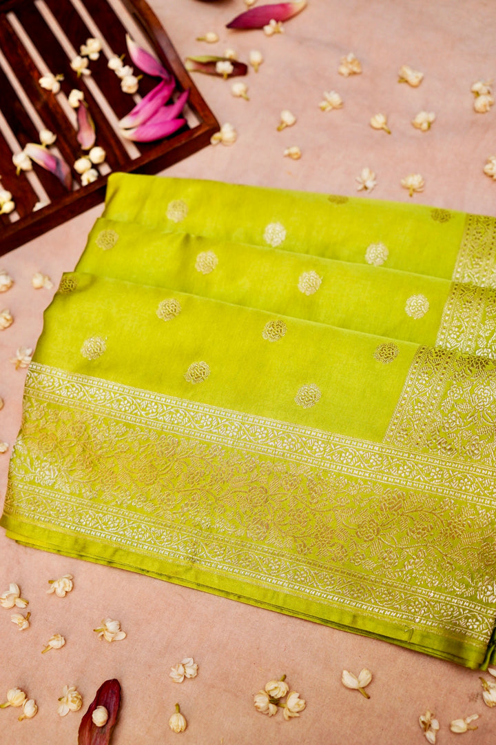 Vibrant Grace in Neon Green Mashru Silk Saree with All-Over Silver Zari Weave