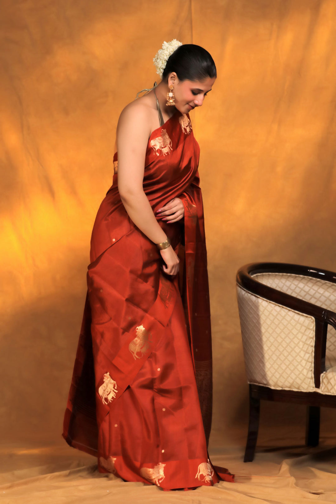 handwoven banarasi pure mashru silk kamdhenu motif satin border saree rust orange side view 1