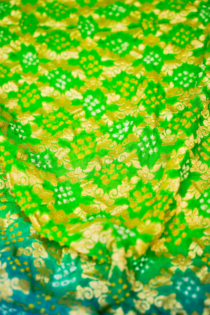 Fresh Elegance Light Green Khaddi Georgette Bandhej Saree with Sky Blue Border