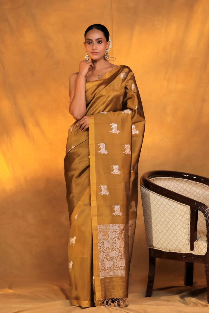 handwoven mustard banarasi pure mashru silk pichwai motif saree front view 1