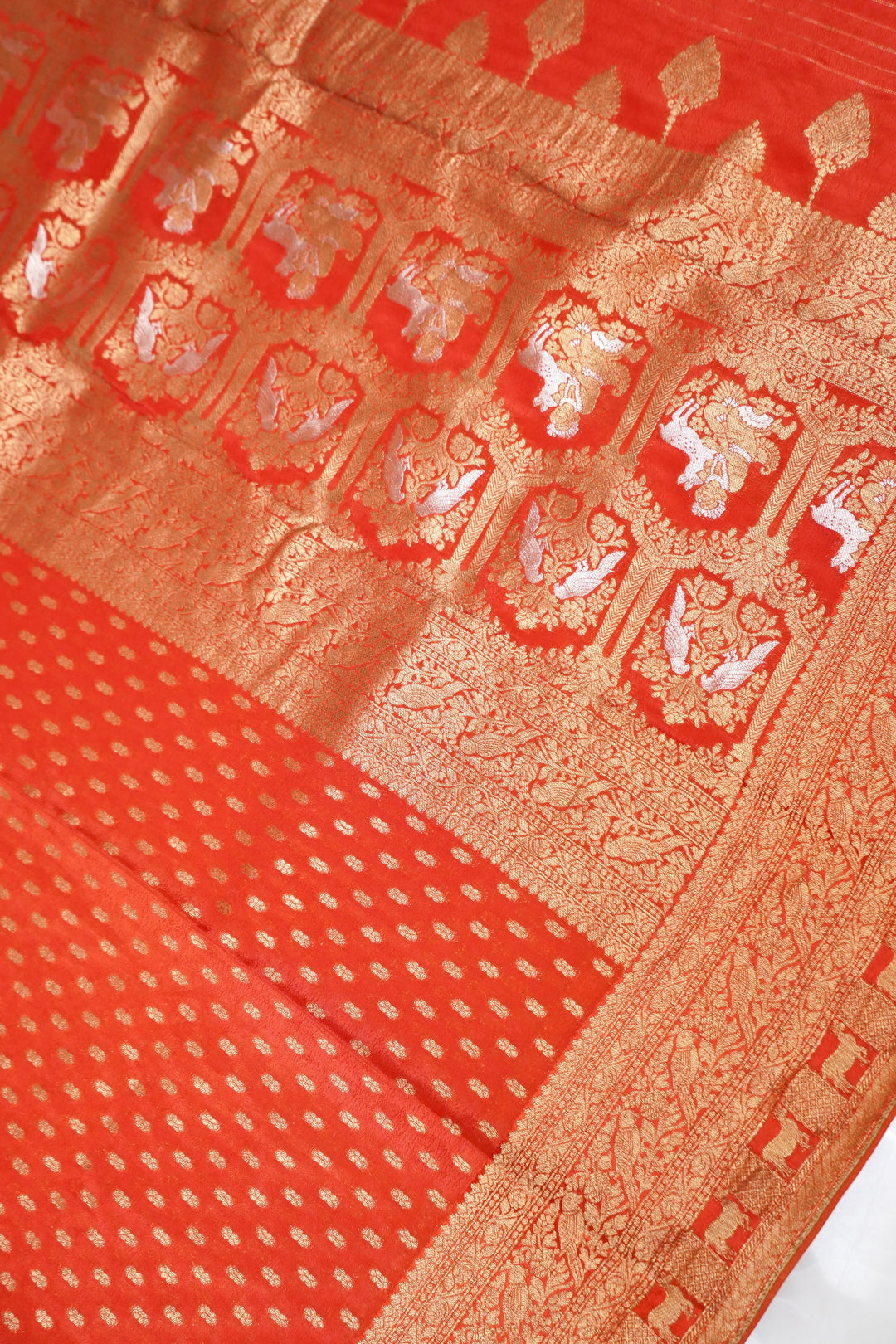 Rich Rust Orange Banarasi Chinon Georgette Saree with Antique Zari Figure Motifs