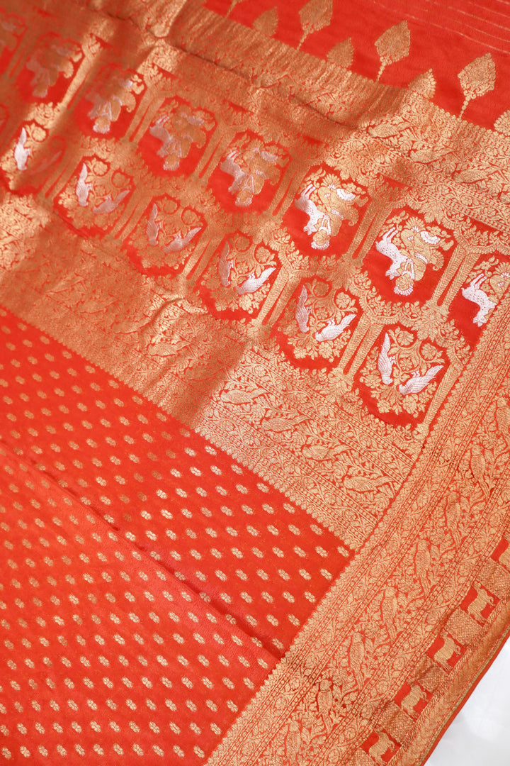 Rich Rust Orange Banarasi Chinon Georgette Saree with Antique Zari Figure Motifs