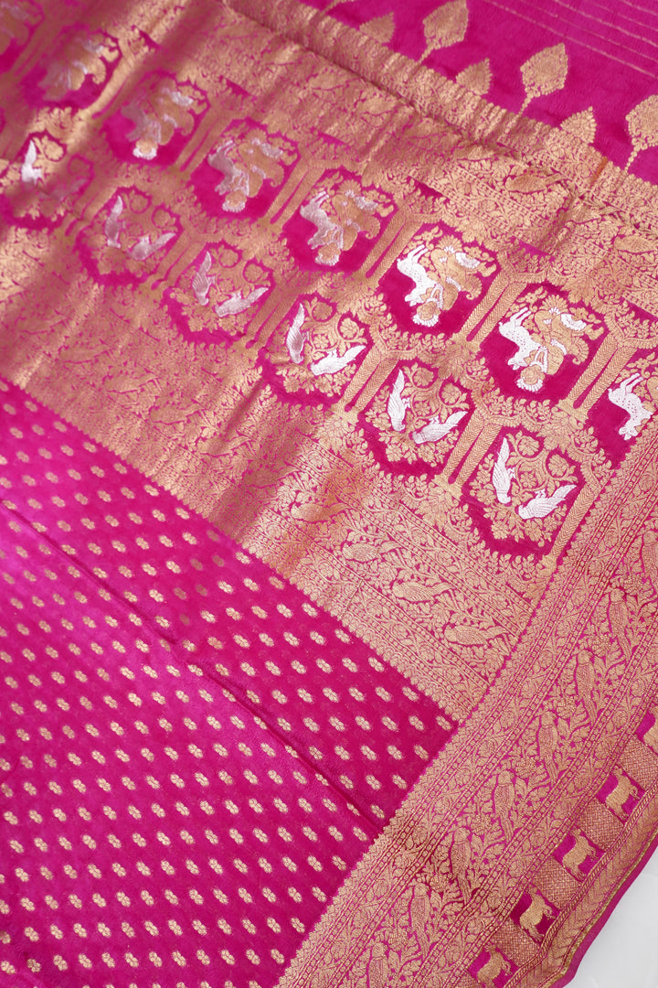 Vibrant Rani Pink Banarasi Chinon Georgette Saree with Antique Zari Figure Motifs
