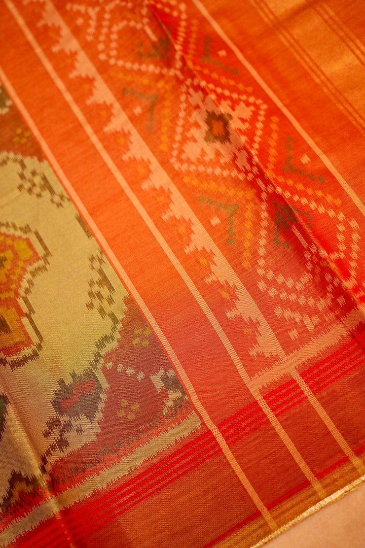 Pista Green Banarasi Silk Tissue Saree with Ikkat Patola Inspired Weave