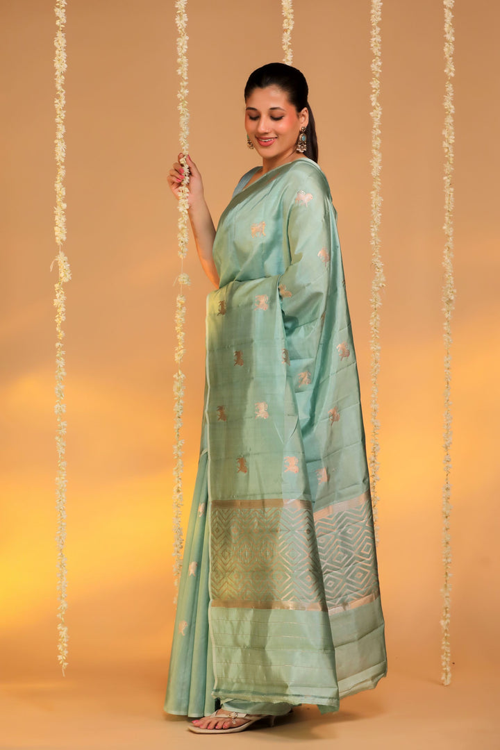 banarasi handloom pastel green pure mashru silk lion motif saree side view 1
