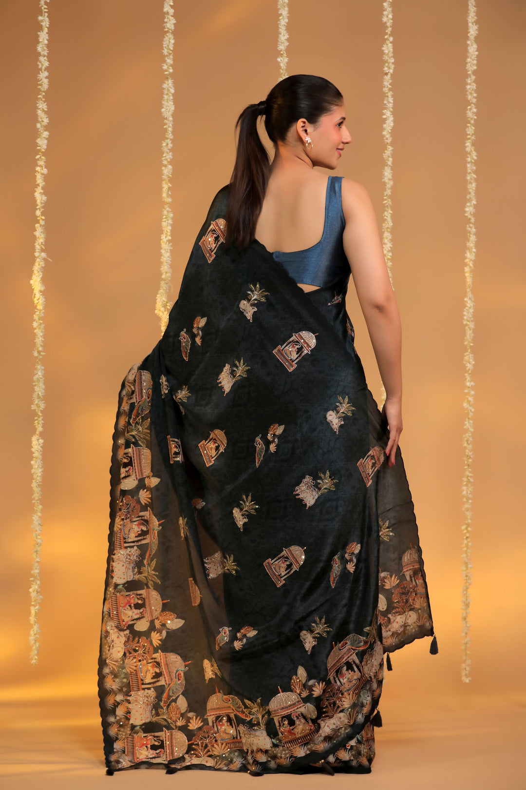 charcoal grey crepe silk katha embroidery figure motif saree back view