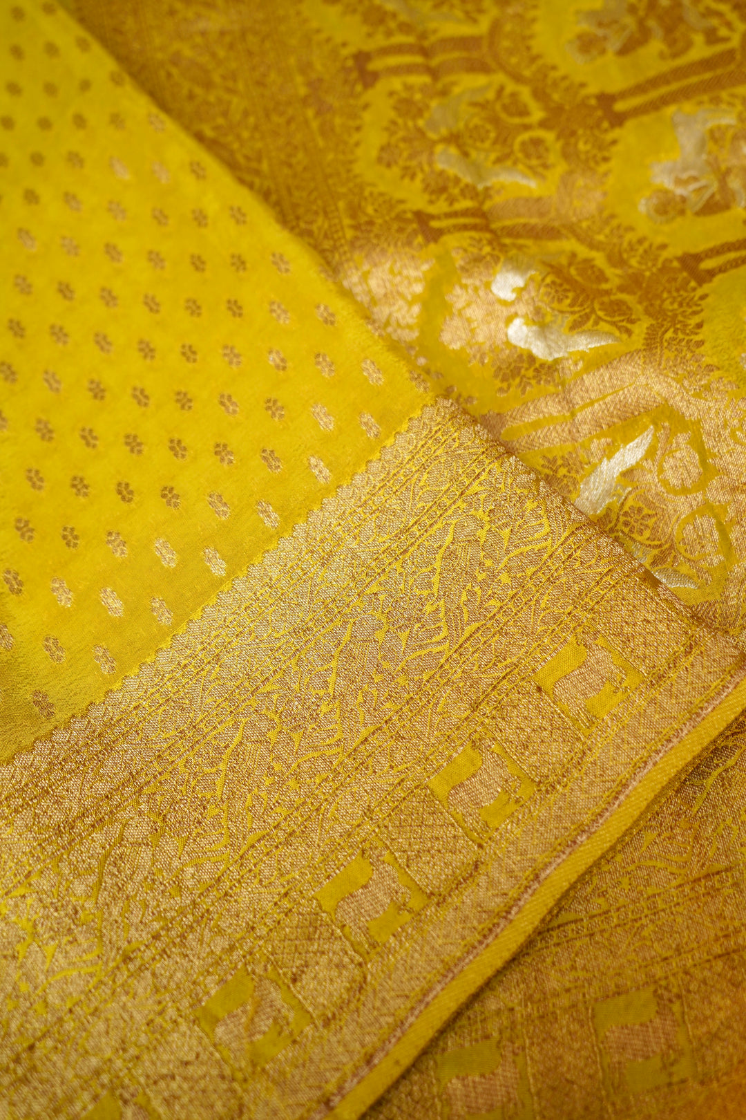 Radiant Mustard Yellow Banarasi Chinon Georgette Saree with Antique Zari Figure Motifs