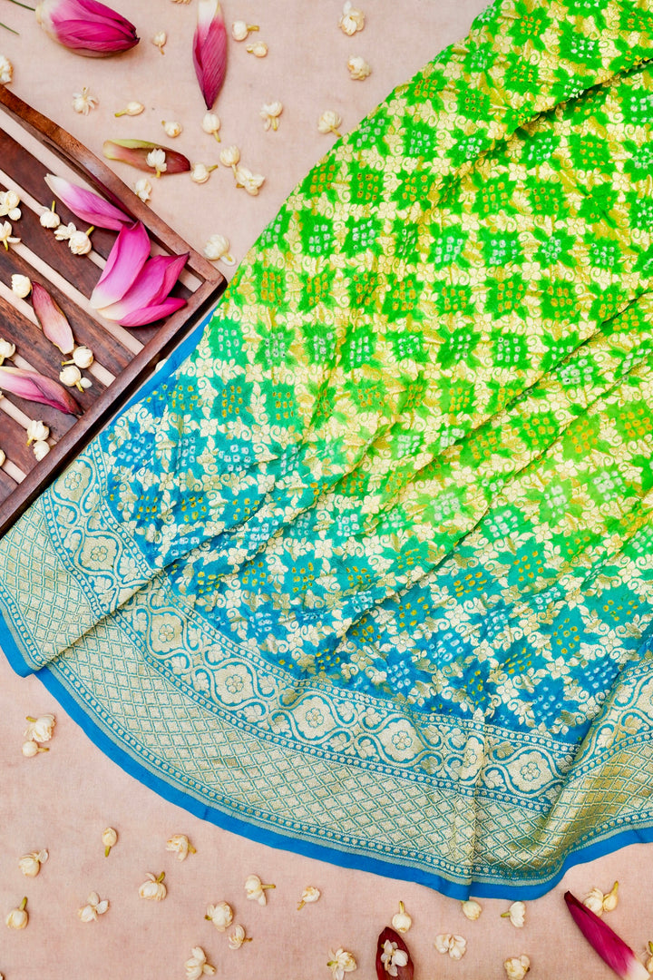 Fresh Elegance Light Green Khaddi Georgette Bandhej Saree with Sky Blue Border