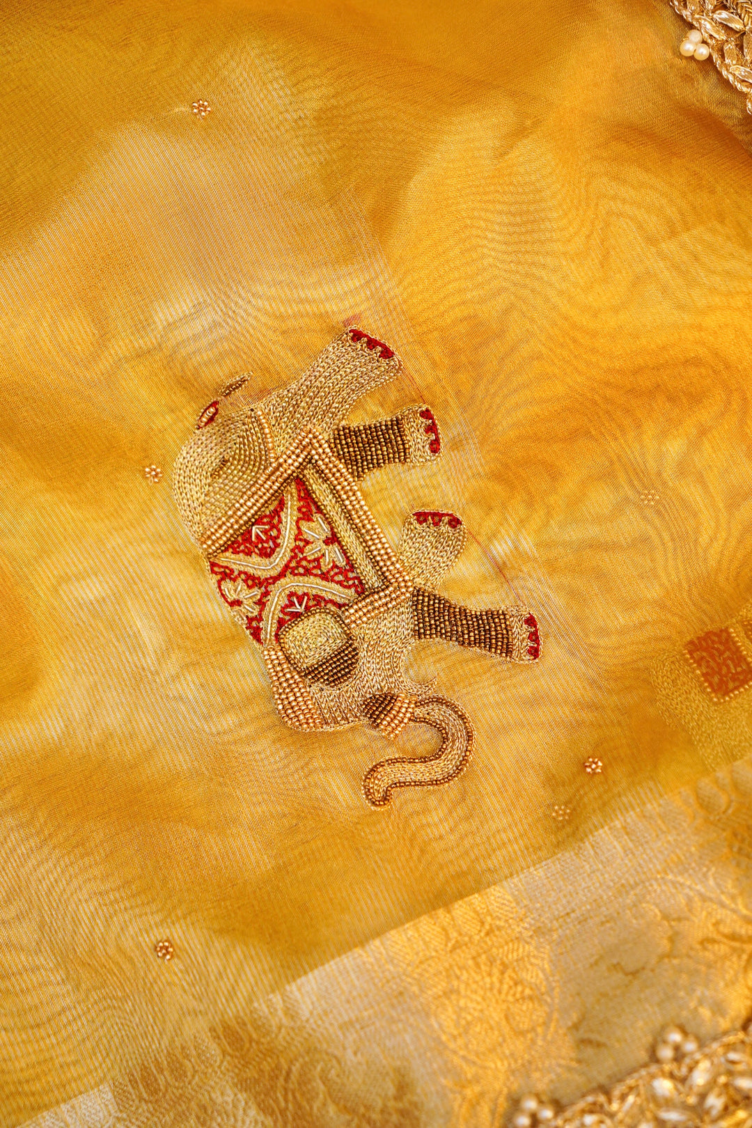 Golden Maharani Tissue Silk Saree with Gajanand Motif Embroidery