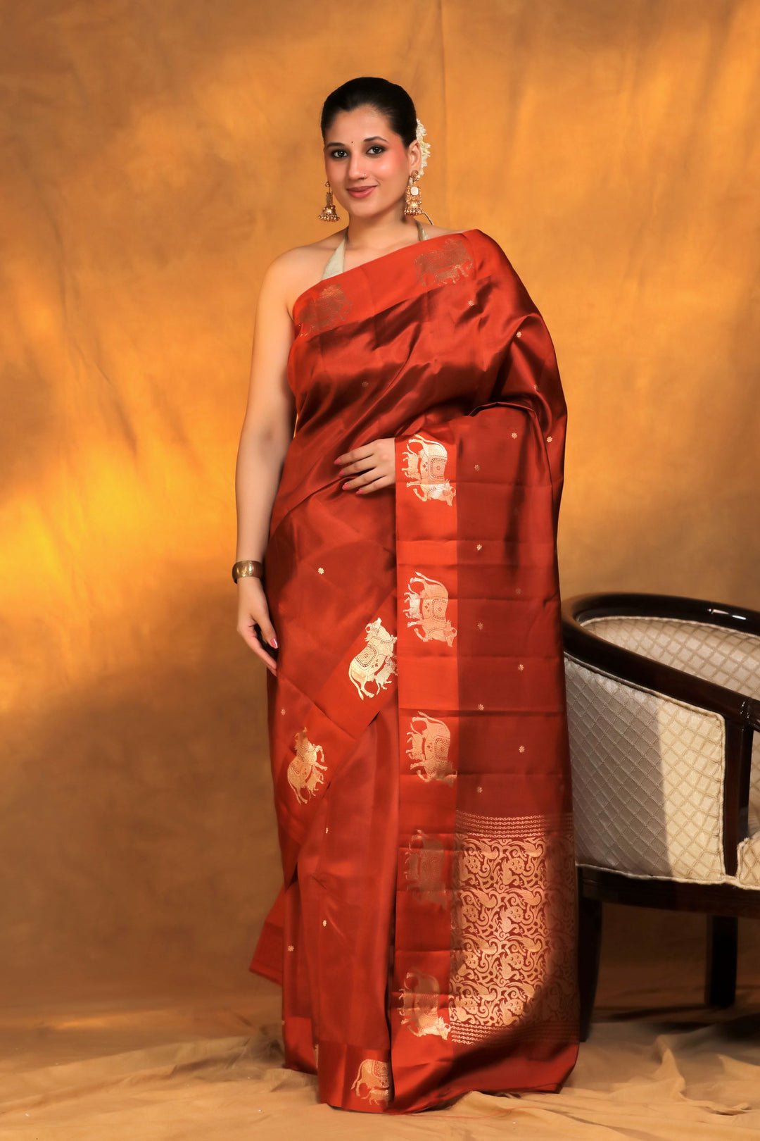 handwoven banarasi pure mashru silk kamdhenu motif satin border saree rust orange front view
