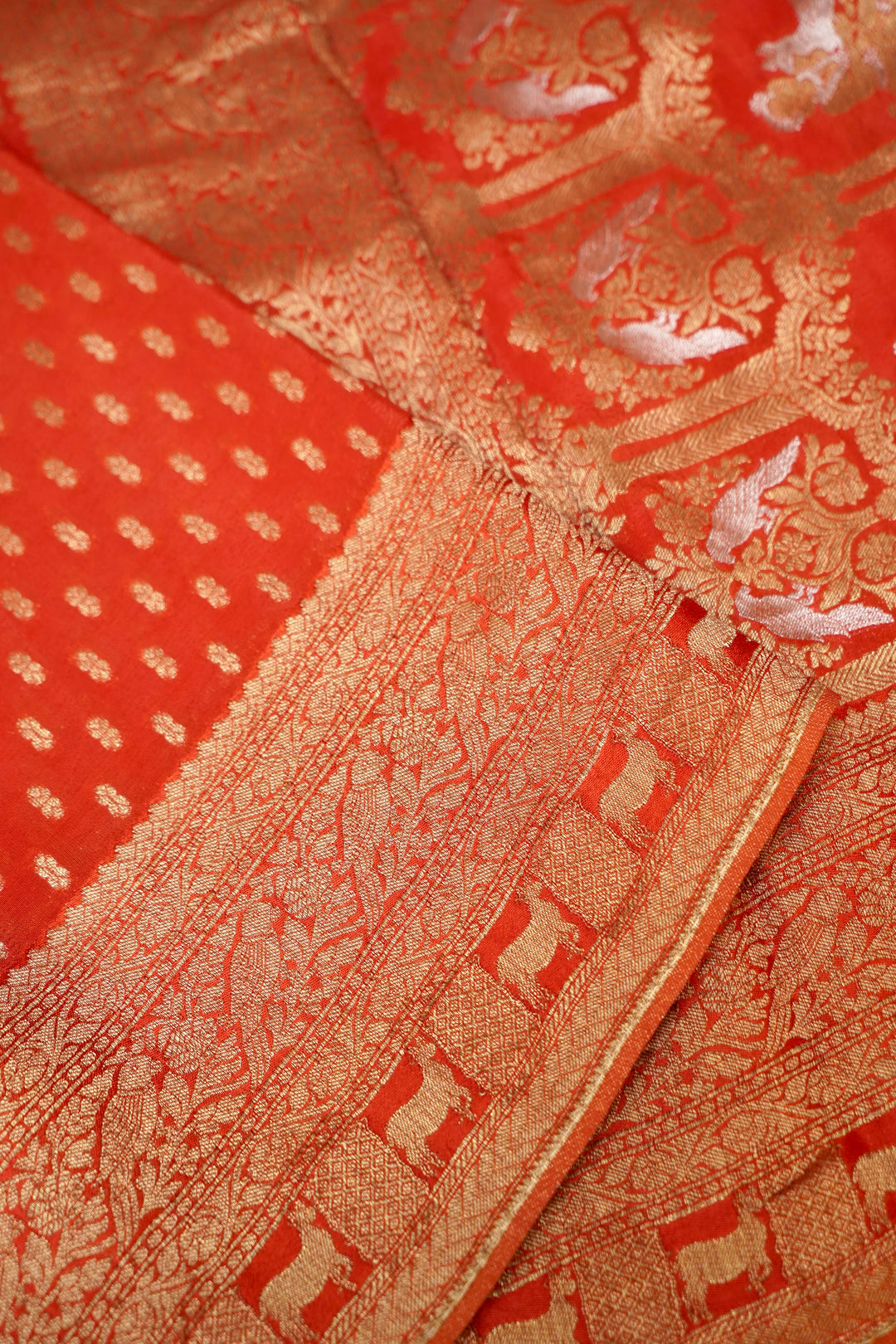Rich Rust Orange Banarasi Chinon Georgette Saree with Antique Zari Figure Motifs