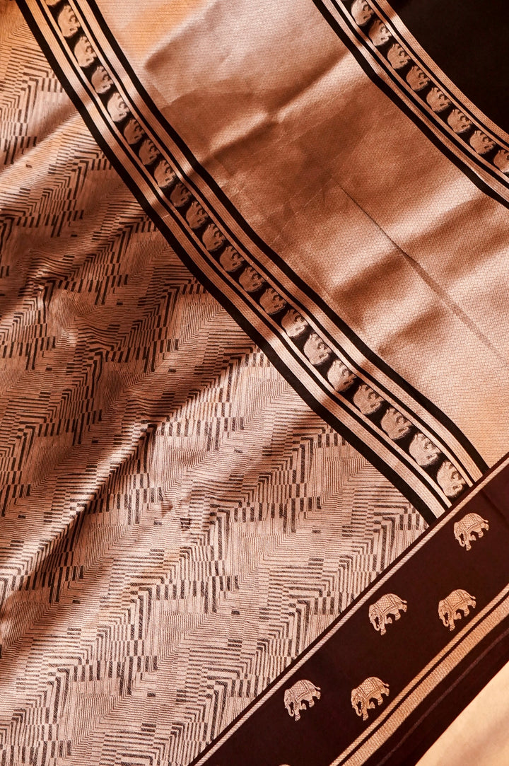 Majestic Earth – Brown Pure Handloom Organza Silk Saree with Elephant Motif Border