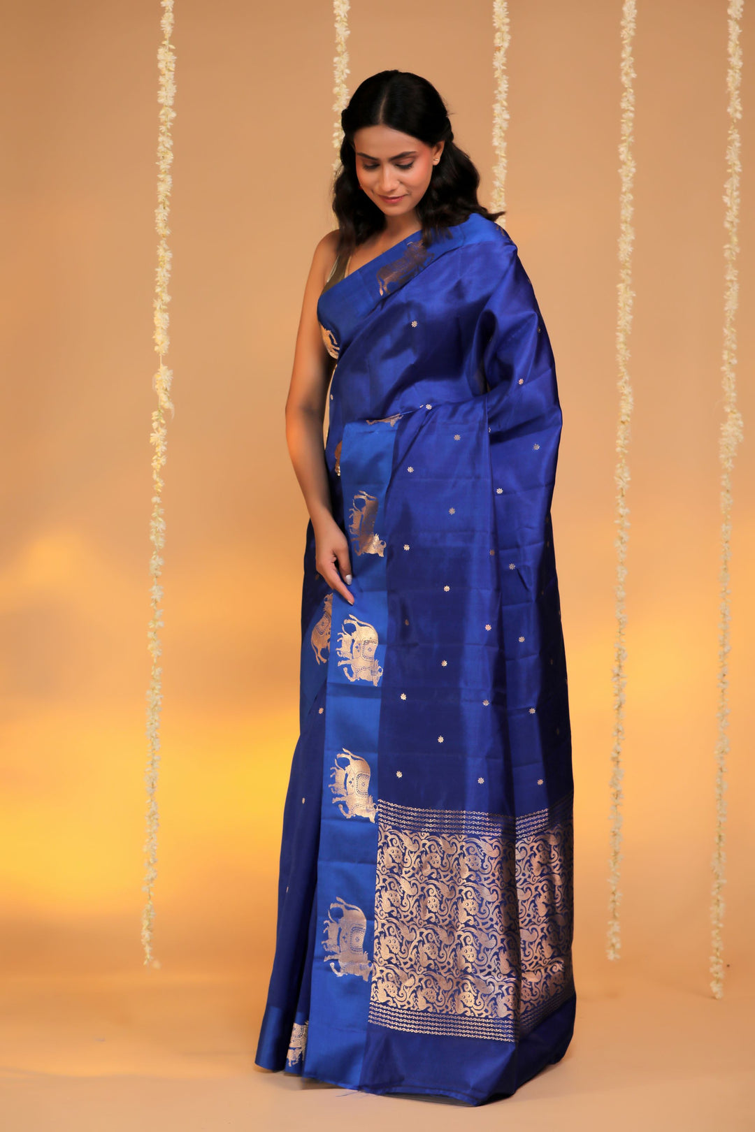 handwoven banarasi pure mashru silk kamdhenu motif satin border saree royal blue side view 1