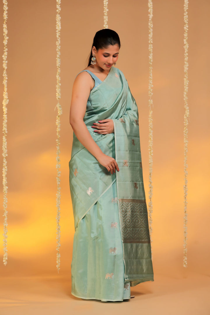 banarasi handloom pastel green pure mashru silk lion motif saree side view 2