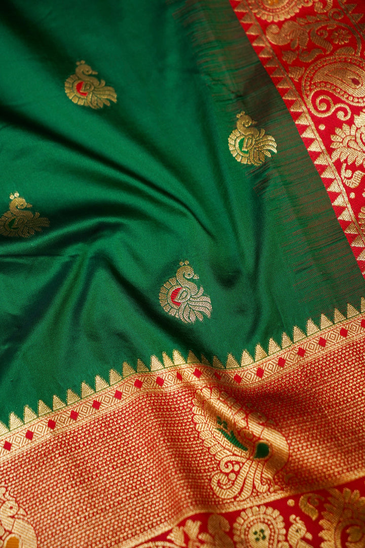 Bottle Green Soft Silk Kanjivaram Inspired Bird Motifs Saree with Red Contrast Border Pallu