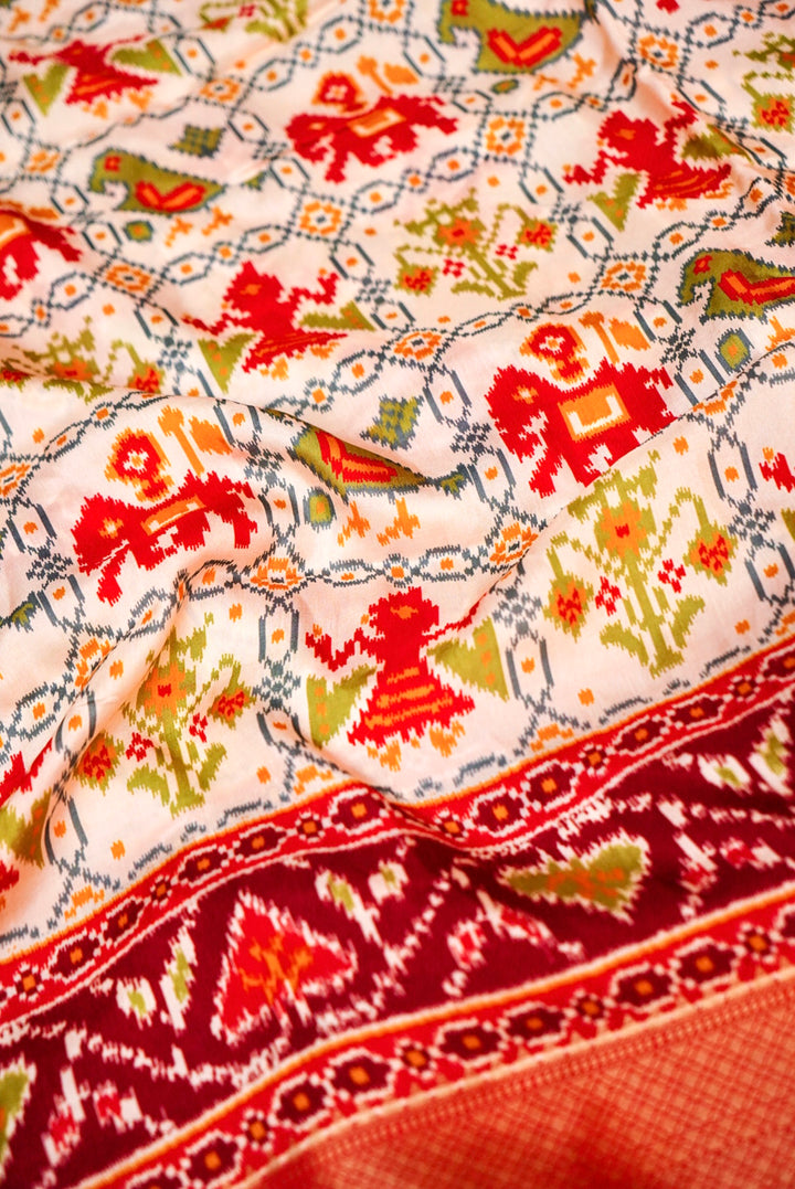 White Patola Silk Saree with Zari Weave Contrast Border