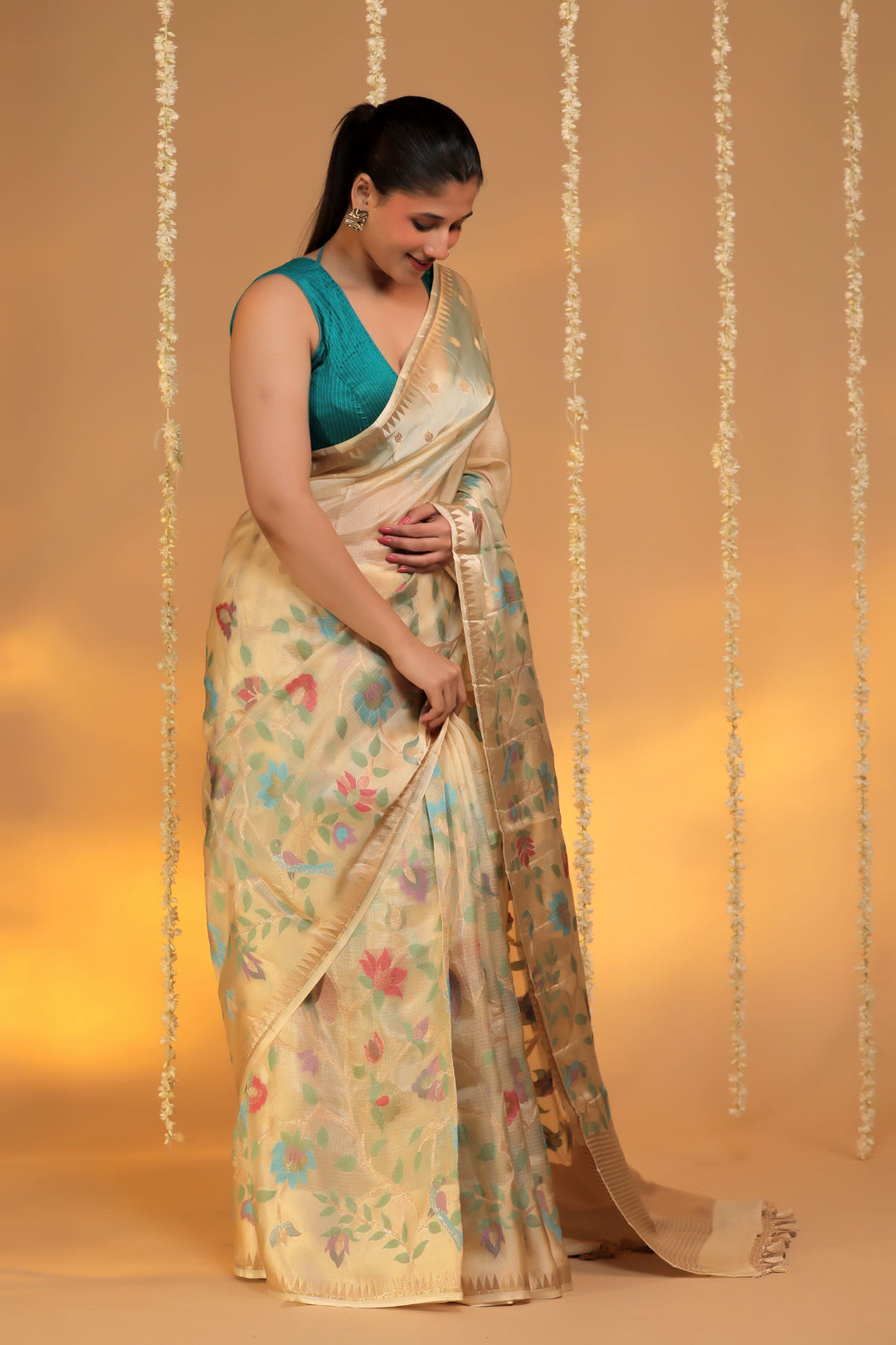 beige kota silk meenakari figure motif saree with silk weaving border side view 2