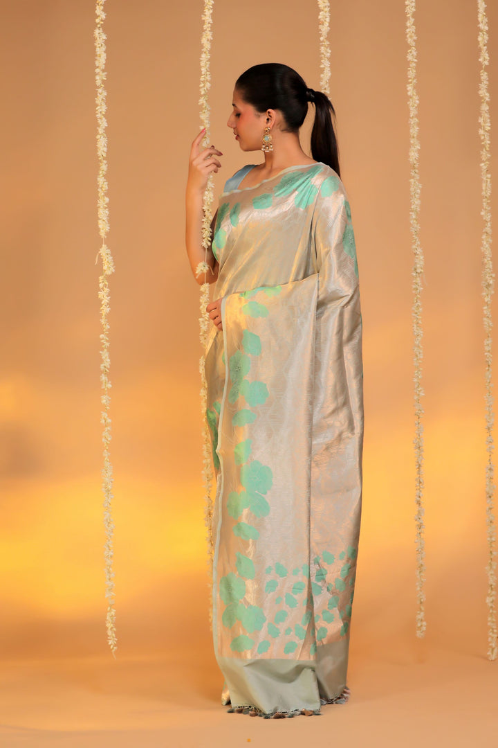 banarasi handloom pastel green pure katan silk structured floral grid motif saree side view
