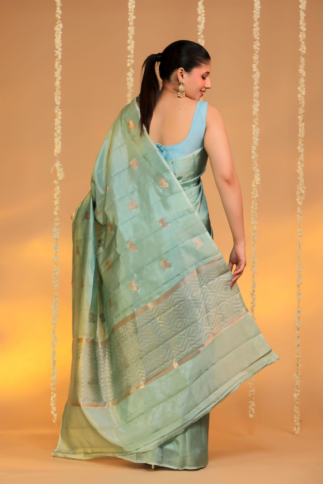 banarasi handloom pastel green pure mashru silk lion motif saree back view