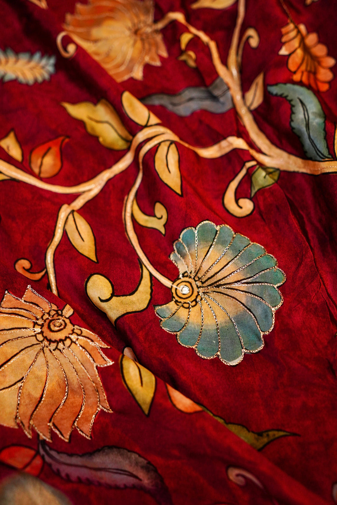 Regal Maroon Elegance: Crepe Silk Saree with Floral Prints