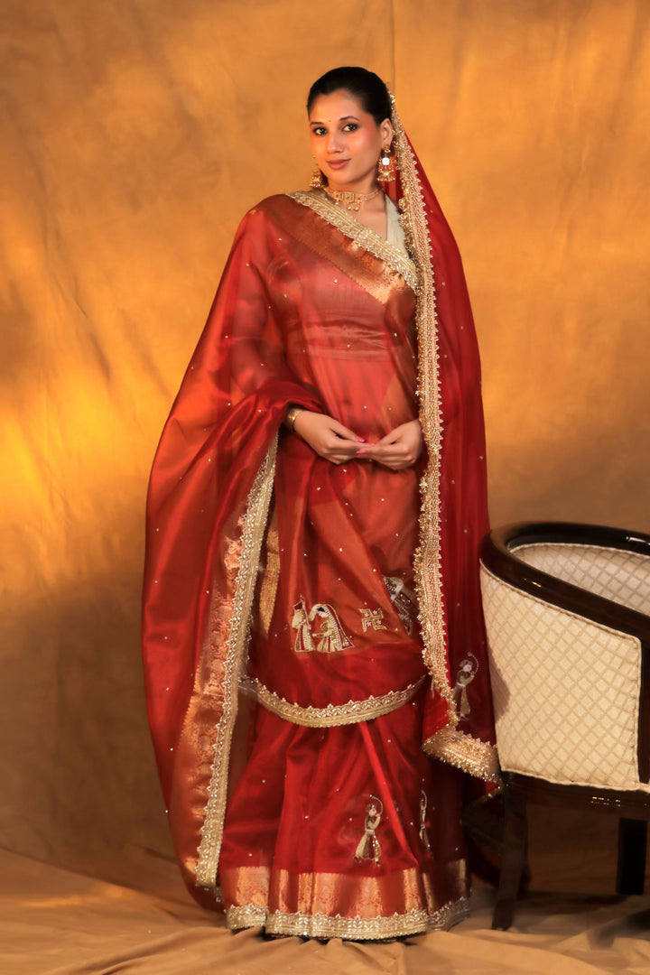 Gajanan motif baarat inspired red pure tissue silk saree front view 1
