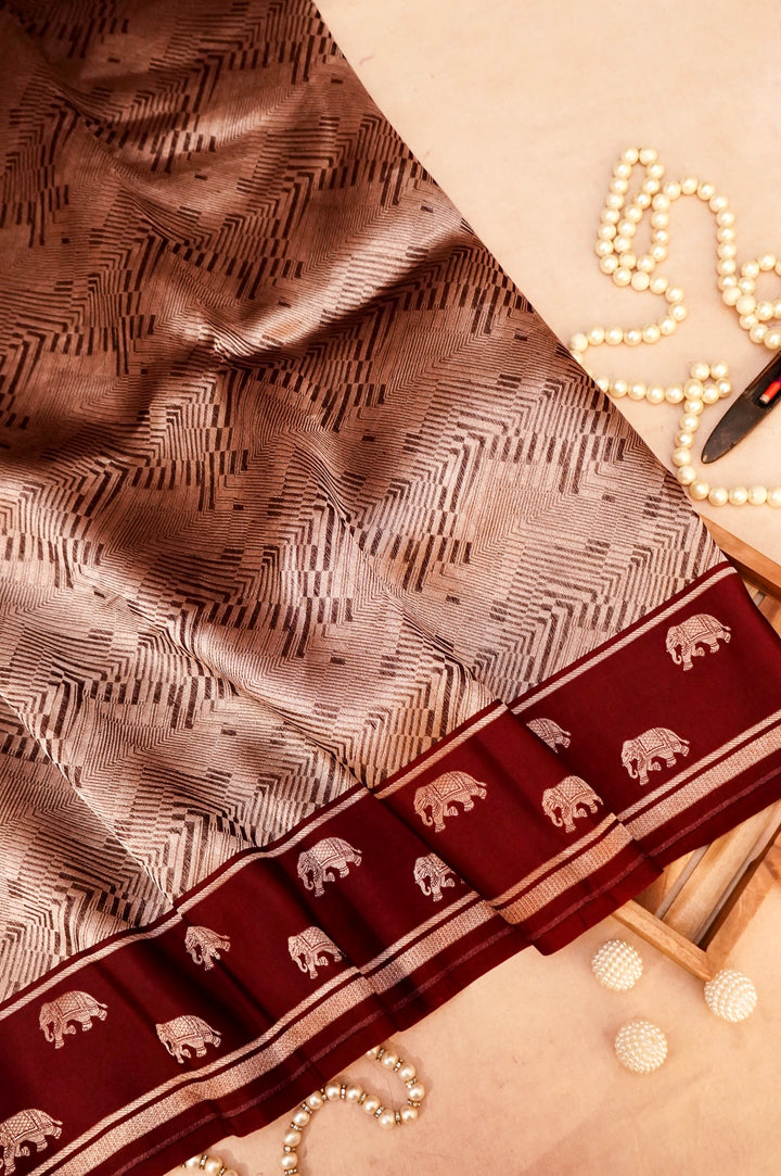 Earthly Elegance – Brown Pure Handloom Organza Silk Saree with Elephant Motif Border