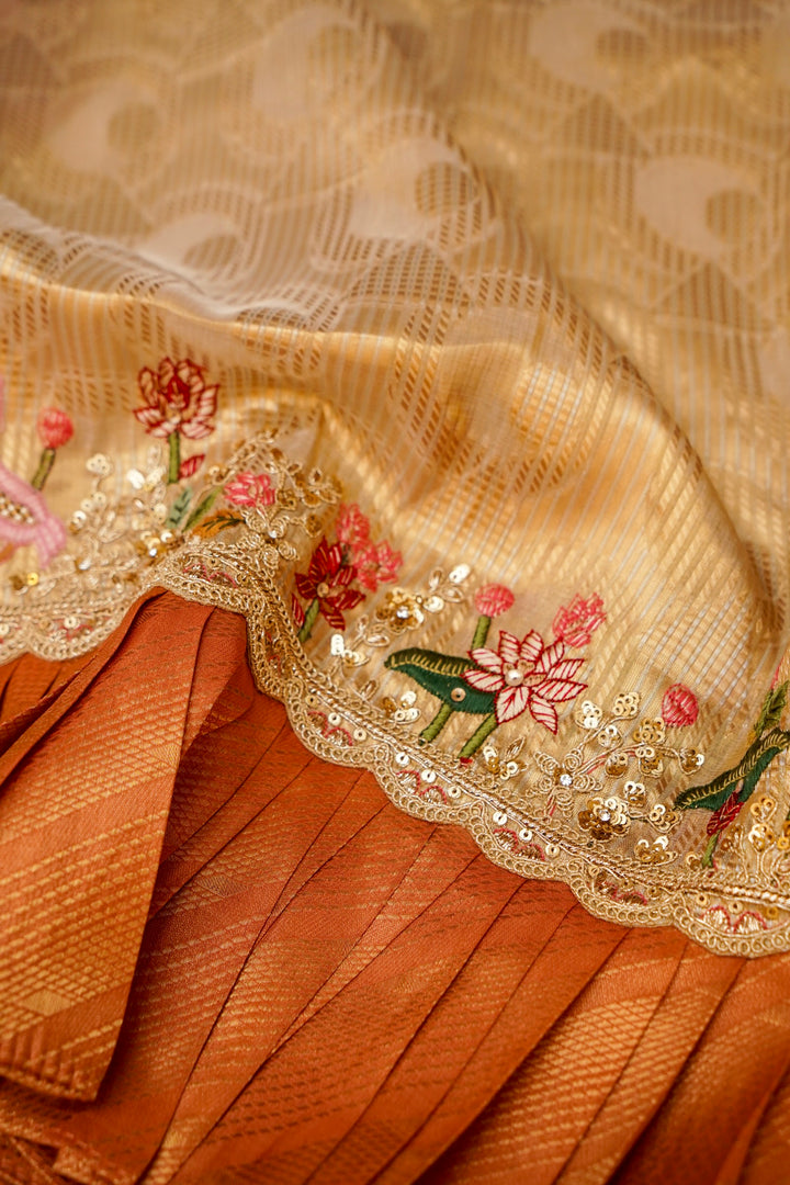 Beige Gold and Orange Lehenga Pattern Half Half Tissue Silk Meenakari Embroidery Saree View 1
