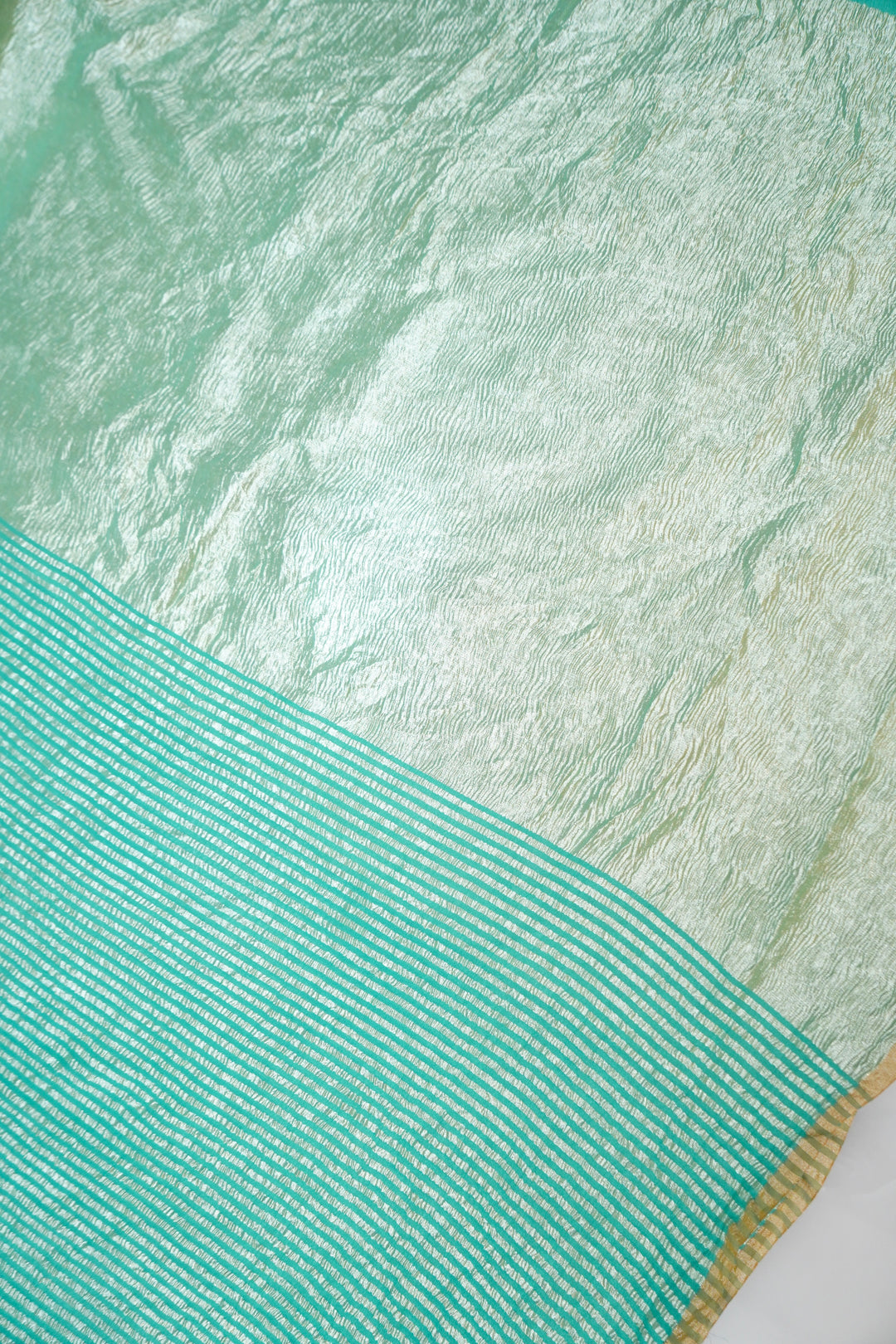Refreshing Aqua Green Muga Georgette Saree with Zari Stripes
