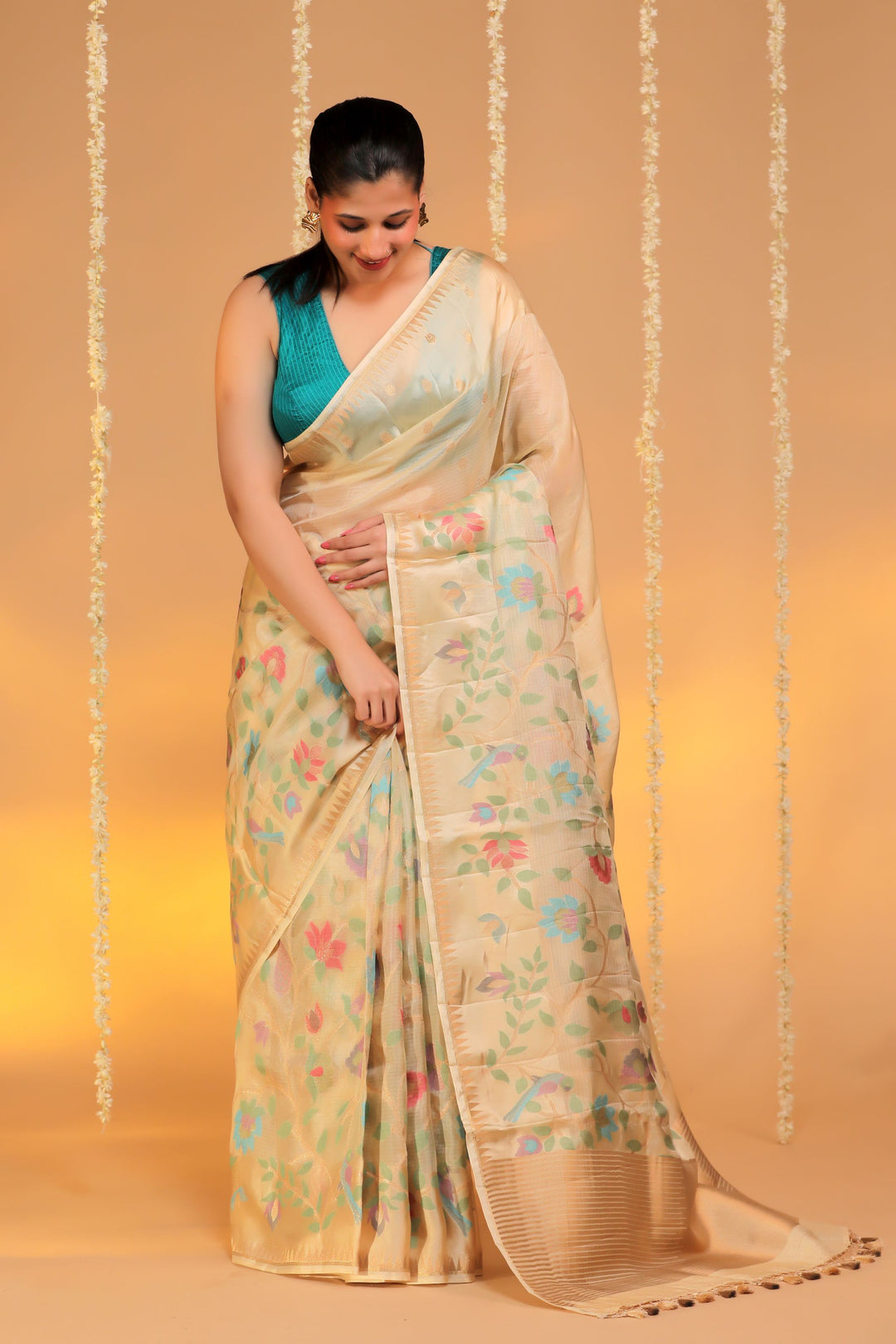 beige kota silk meenakari figure motif saree with silk weaving border front view 2