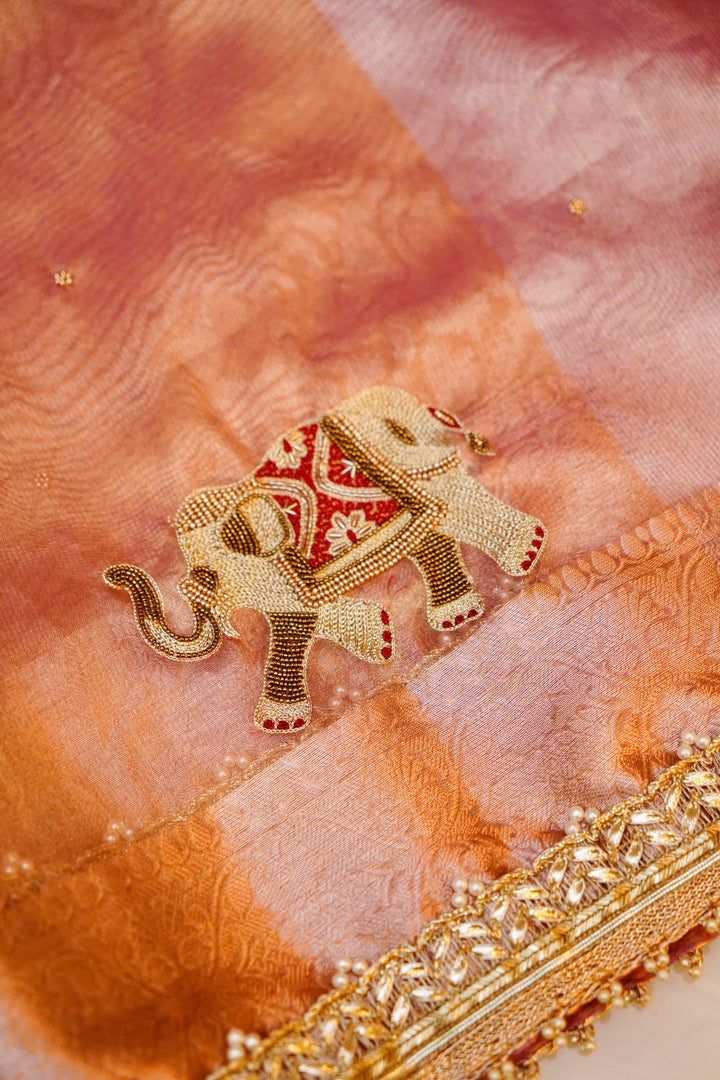 Golden Tissue Silk Saree with Pitta Zari Elephant Motifs & Scallop Border